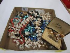 A mixed lot of costume jewellery including earrings etc.