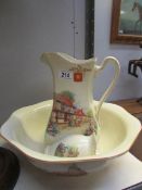 A cottage decorated jug and basin set.