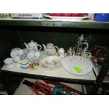 A shelf of assorted teaware, beer steins etc.