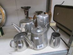 A mixed lot of silver plate tea ware and spill vases.