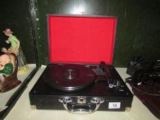 A modern table top record player.