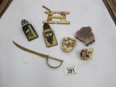 A mixed lot including pen stand, paper clips, netsuke etc.