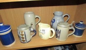 A pub jug, beer steins etc.