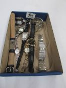 A quantity of quartz watches including Versace etc.