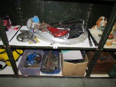 2 shelves of old bicycle parts including rod brakes etc.