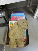 A quantity of children's books including Beano annuals and a Teddy bear.
