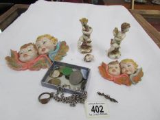 A quantity of Italian cherub figures (some a/f) and a small box of jewellery.