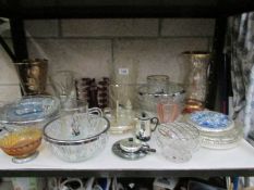 A shelf of glass ware.