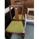 A pair of Edwardian chairs.