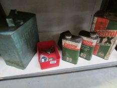 A BP Shell petrol can with 3 Castrol cans, petrol gauge, Smith's amp gauge and one other amp gauge.