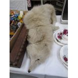 A vintage fox fur stole.