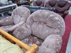A pair of arm chairs.