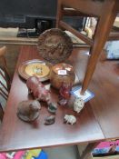 A mixed lot of wooden items including pigs, lidded jar etc.