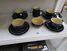 14 pieces of Denby tea ware.