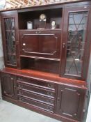 A mahogany effect wall unit.