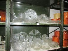 2 shelves of glass ware.