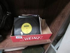 A small quantity of 45 rpm records including Stevie Wonder.