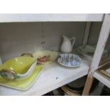 A strainer bowl on stand, 3 other dishes and a jug.