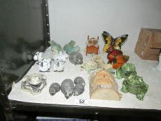 A quantity of animal figures.