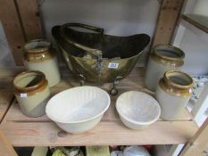 4 stoneware pots, 2 jelly moulds and a brass coal scuttle.