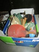 A box of table tennis kit etc.