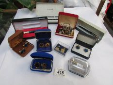 A mixed lot of costume jewellery, cuff links and 3 cased Parker pens,