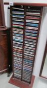 A CD rack with CD's.