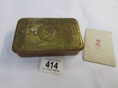 A WW1 Princess Mary tin with card.