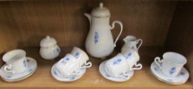 A 15 piece blue and white coffee set.