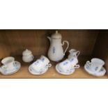 A 15 piece blue and white coffee set.