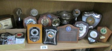 A shelf of trophies,