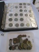 An album of UK coins including silver and a tray of UK and foreign coins.