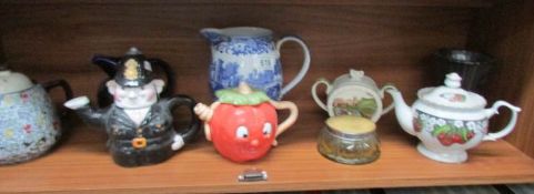 A mixed lot including blue & white jug, teapots etc.
