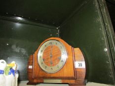 A mantel clock.