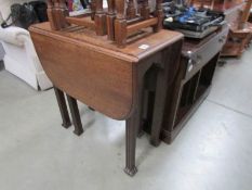 An oak gate leg table.