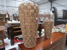 2 large wicker vases.