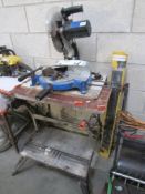 A Nutool mitre saw, a work bench and 2 subsidiary stands.