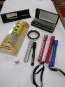 A quantity of Maglite torches etc.