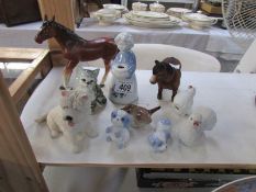 A mixed lot of figures including horses, cat, dogs etc.