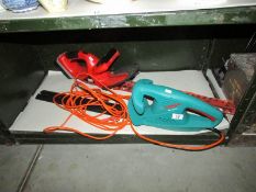 A Bosch hedge trimmer and one other,