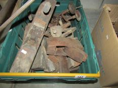 A mixed lot of old woodworking tools including planes, routers, hand drills etc.