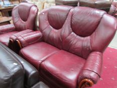 A leather 2 seat sofa and chair.