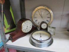 2 wall clocks and 3 other clocks.