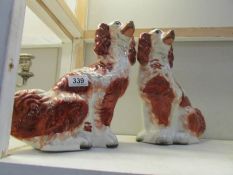 A pair of Staffordshire spaniels.