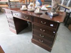 A good sized mahogany double pedestal desk.