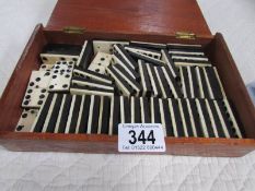 A set of 9 spot dominoes.