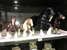 4 large pottery horses.