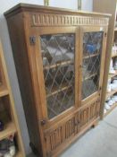 A good quality lead glazed oak book case.