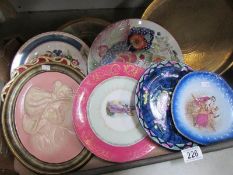 A box of assorted plates.