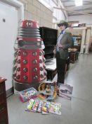 A full size cardboard cut out of a Dalek and Matt Smith as Doctor Who, A Tardis console,